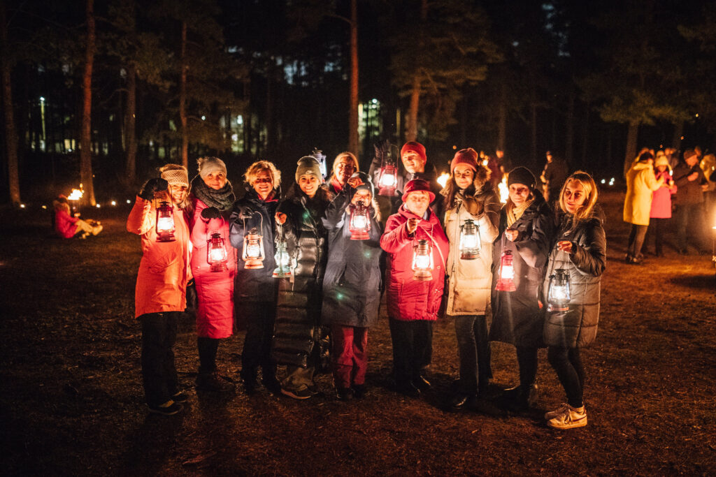 Corporate group on a guided Matkafy lantern tour in Tallinn