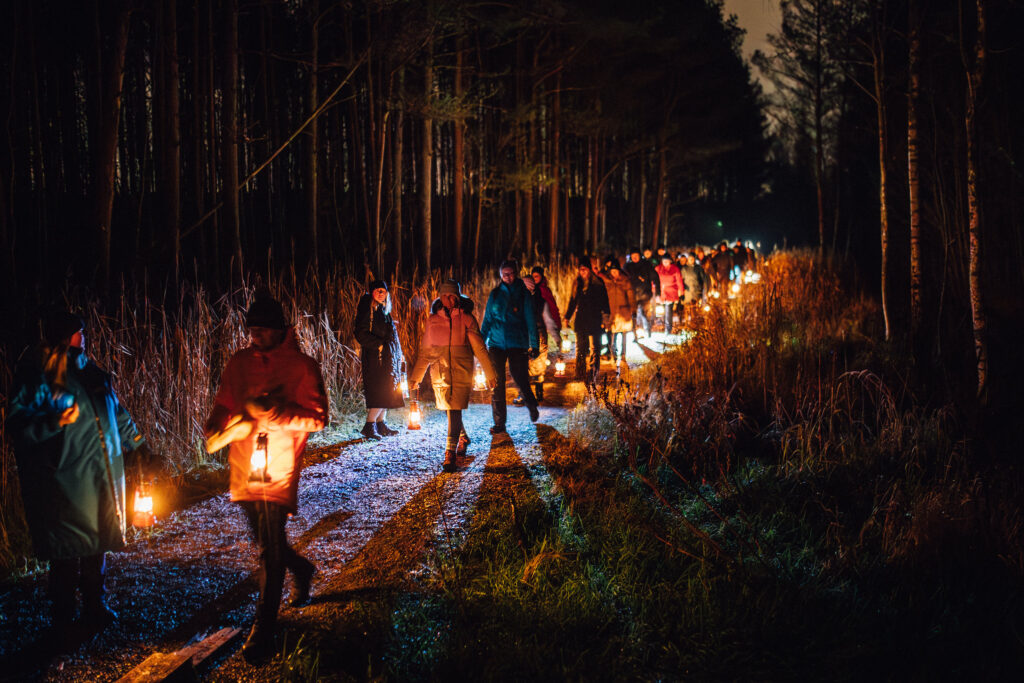 Corporate group on a guided Matkafy lantern tour in Tallinn