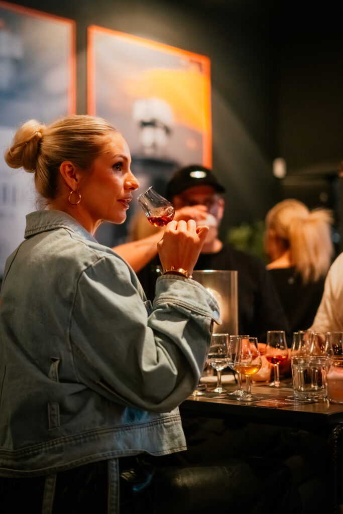 Conference group on a distillery tour and tasting at Peninuki Distillery, Tartu