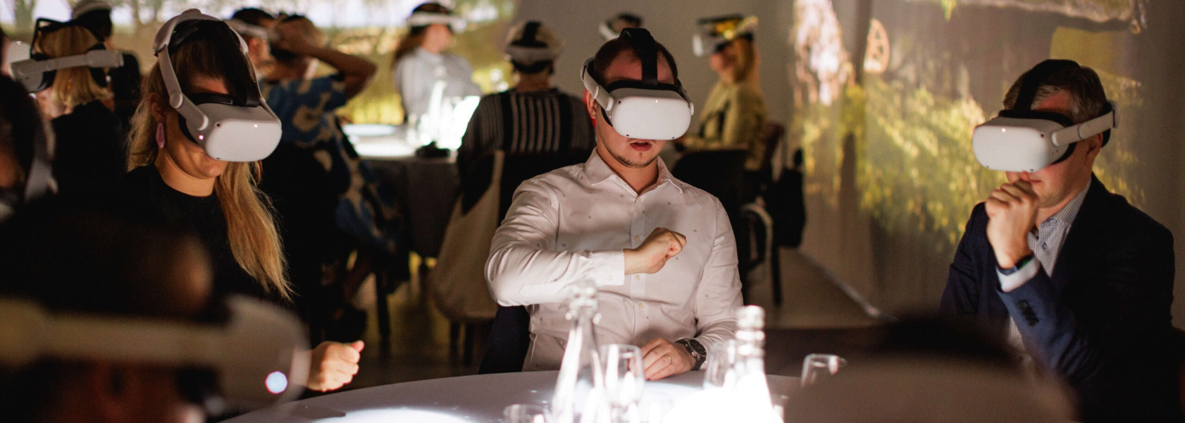 Dinner guests wearing VR headsets at PROTO Invention Factory in Tallinn’s Noblessner district